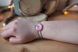 Bracelet jonc argenté spirale rose